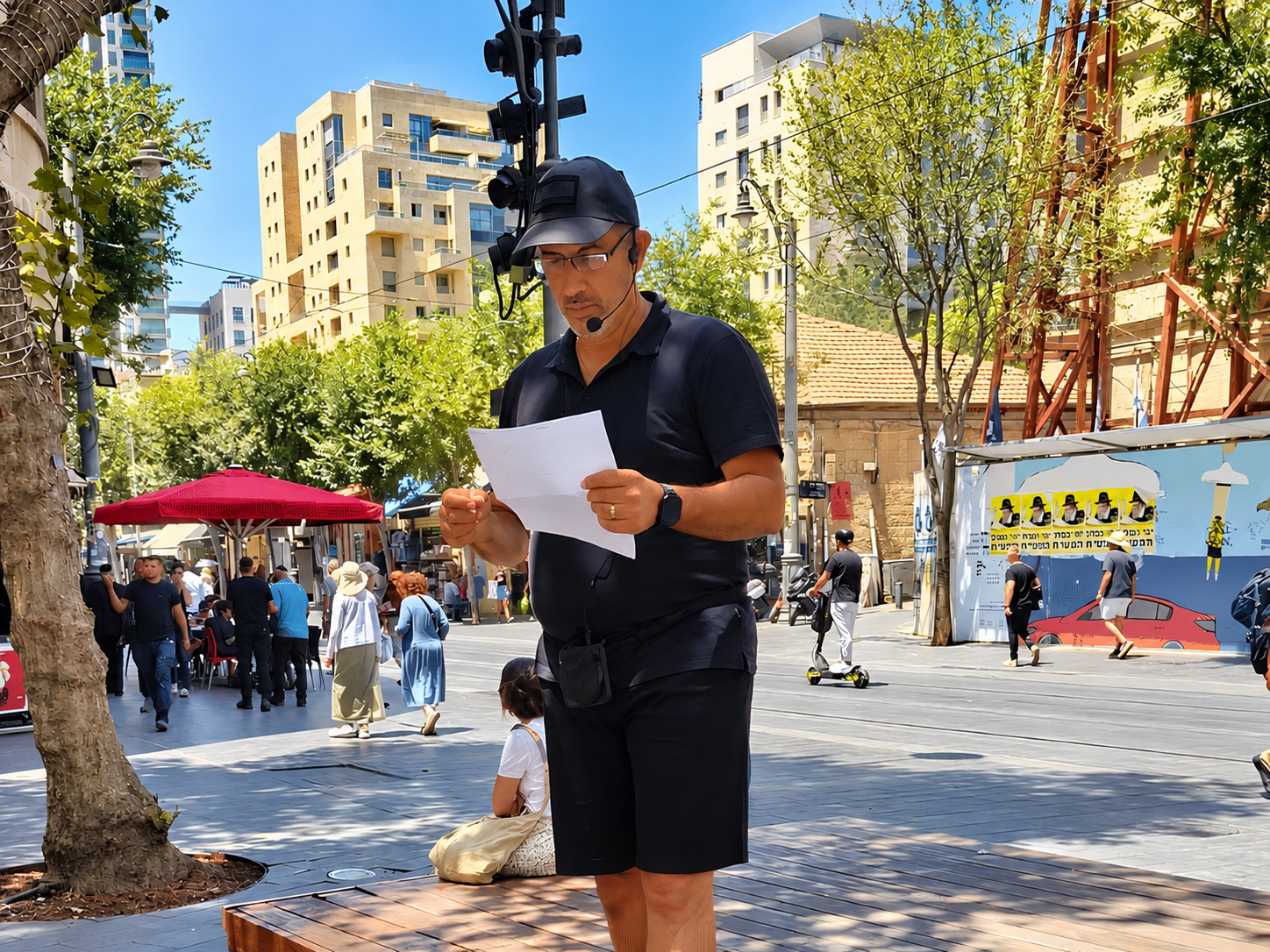Elias Maron sharing the Gospel on a street in Jerusalem