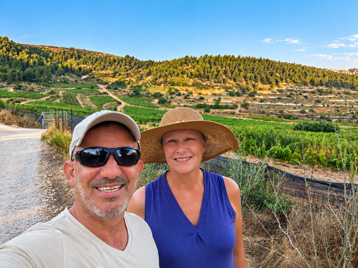 Elias Maron and Antoinette smiling together outdoors in Israel.